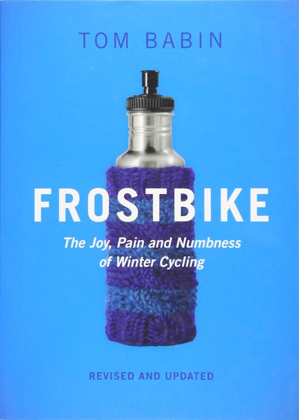 Book cover: Frostbike by Tom Babin. Featured image is a water bottle with a blue knit koozie. Subtitle: The Joy, Pain and Numbness of Winter Cycling. Revised and updated.